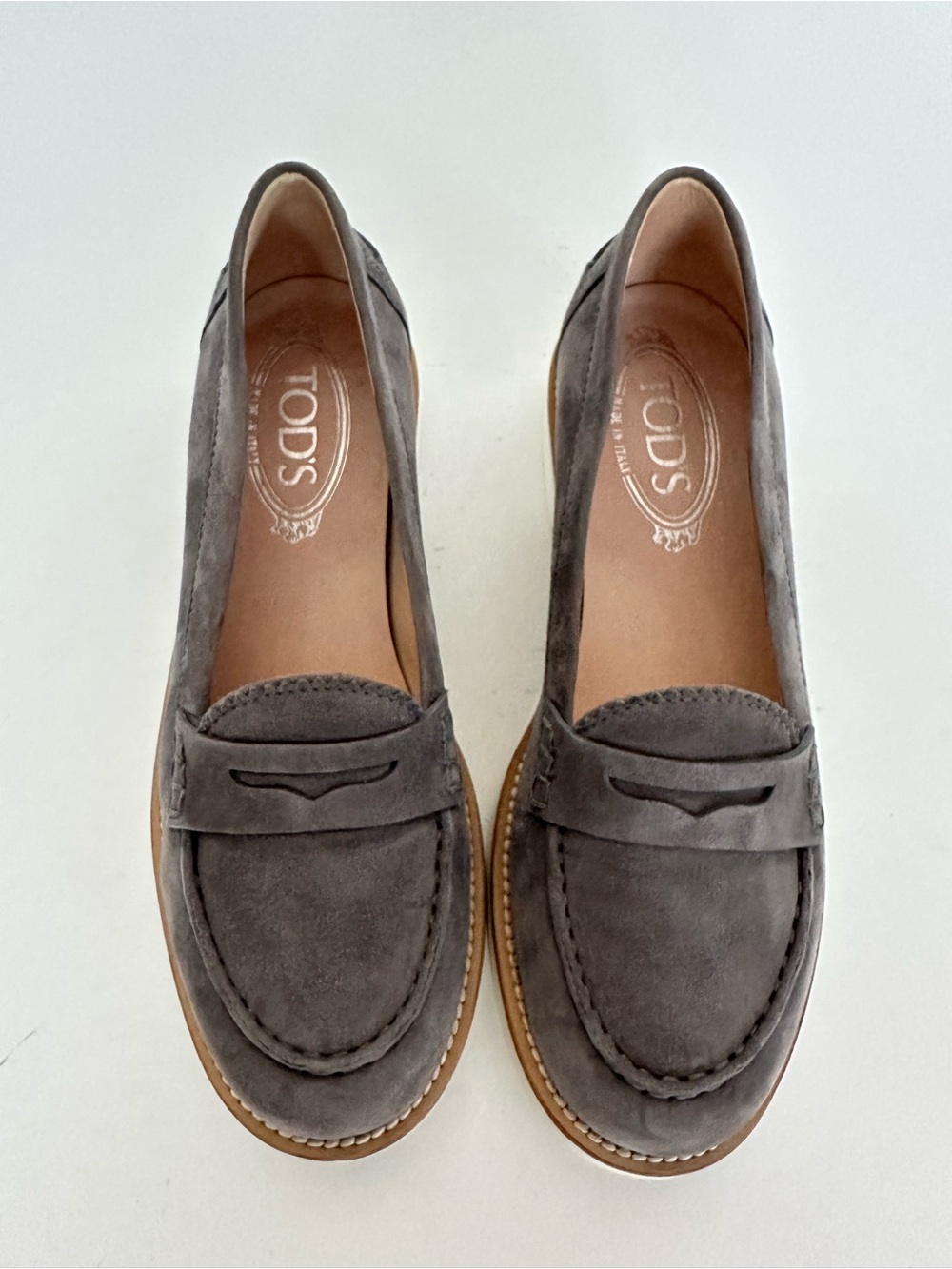 Tod’s grey suede loafers